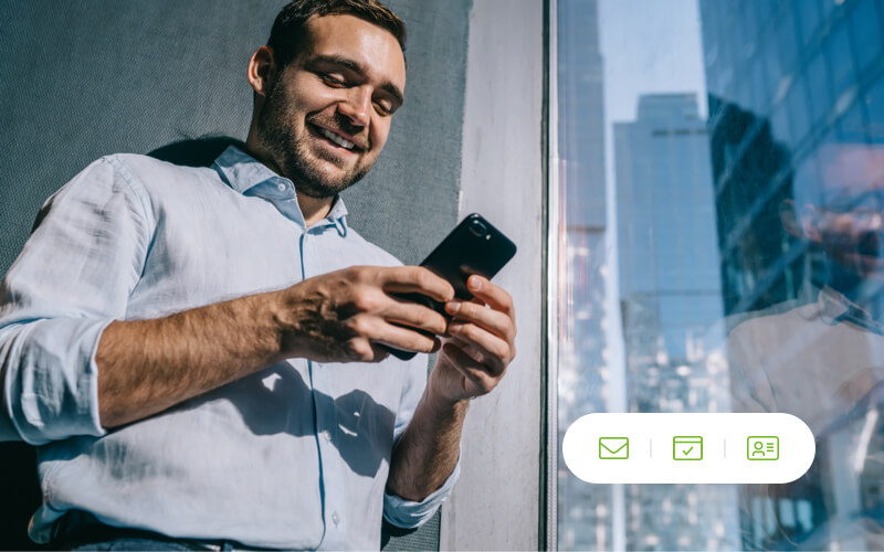 Man checking his email on a phone for a deal.